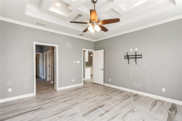 unfurnished bedroom featuring light wood finished floors, baseboards, visible vents, coffered ceiling, and crown molding