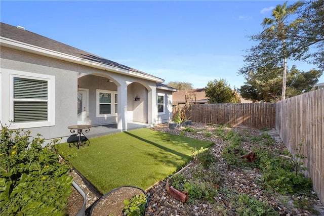 view of yard with a fenced backyard