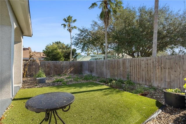 view of yard featuring a fenced backyard