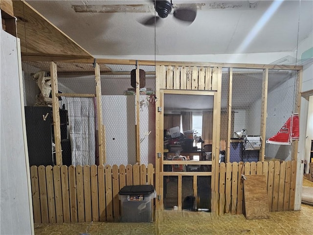basement featuring ceiling fan