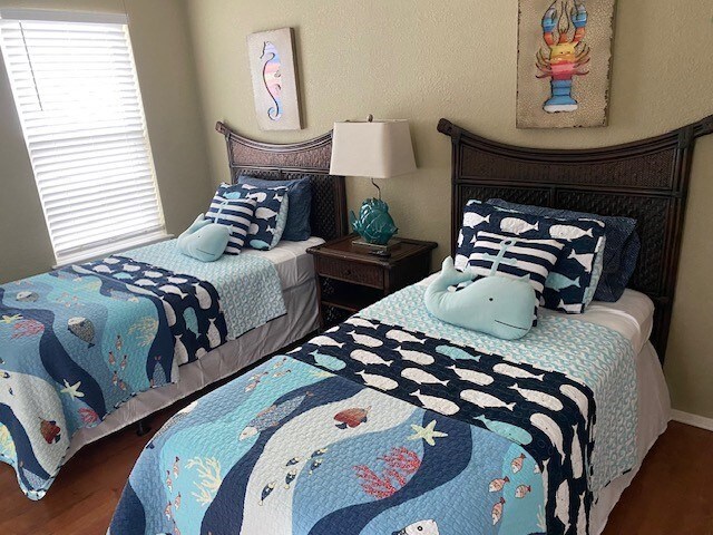 bedroom featuring wood finished floors