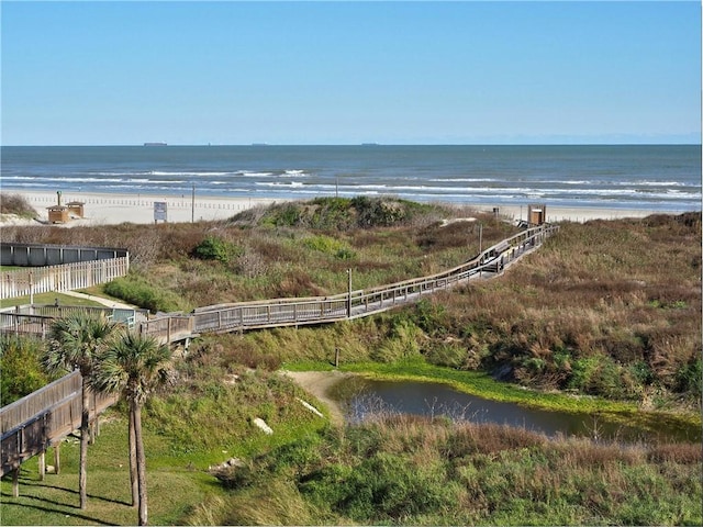 property view of water featuring a beach view