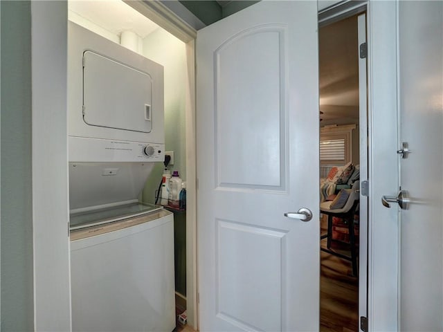 laundry area featuring stacked washer and clothes dryer