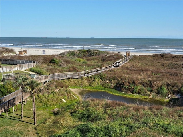 property view of water featuring a beach view