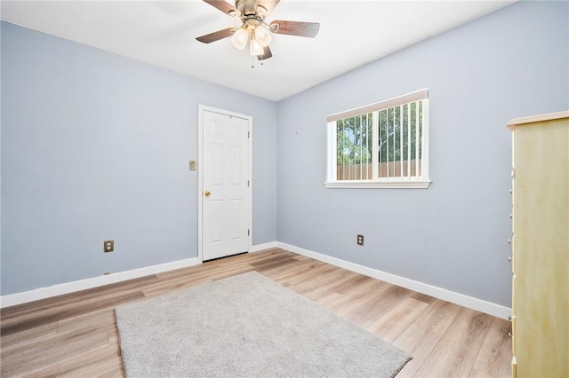 109 Starlight, Ingleside, TX 78362 - unfurnished room with baseboards, a ceiling fan, and light wood-style floors