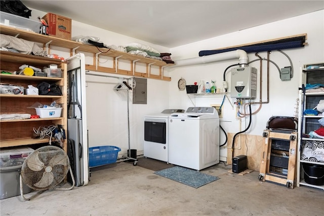 109 Starlight, Ingleside, TX 78362 - laundry area featuring laundry area, water heater, electric panel, and washer and clothes dryer