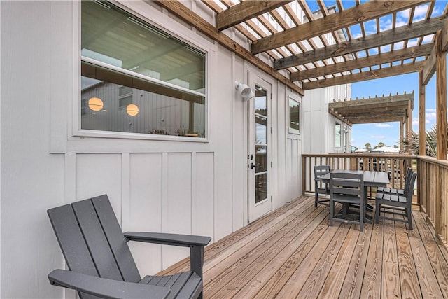 wooden terrace with a pergola