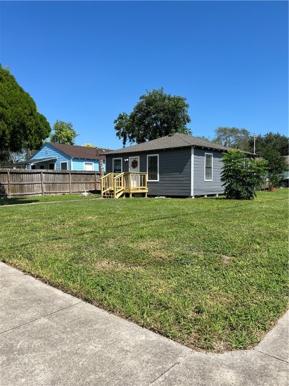 exterior space featuring a lawn