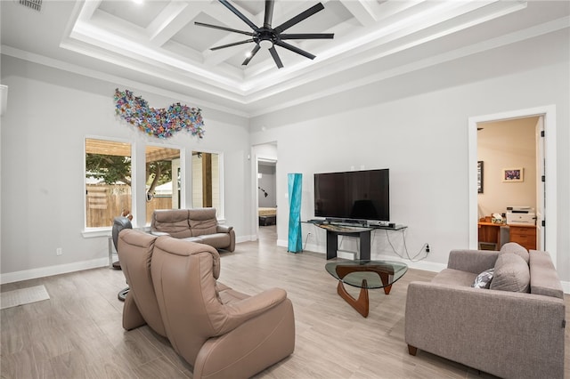 living room featuring beamed ceiling, ceiling fan, ornamental molding, and coffered ceiling