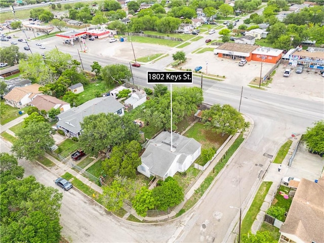 birds eye view of property with a residential view