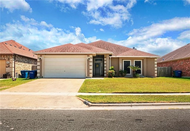 6730 Old Square Dr, Corpus Christi, TX 78414 - view of front of house with an attached garage, driveway, and stucco siding