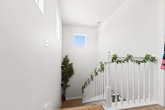 1928 Estes Flats Dr, Aransas Pass, TX 78336 - stairway featuring carpet floors and baseboards