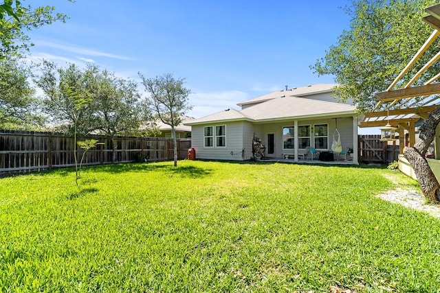 1928 Estes Flats Dr, Aransas Pass, TX 78336 - rear view of property featuring a pergola