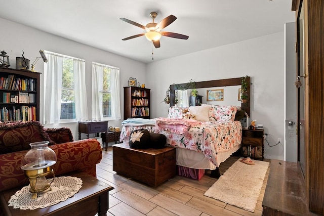 1928 Estes Flats Dr, Aransas Pass, TX 78336 - bedroom featuring a ceiling fan and light wood finished floors
