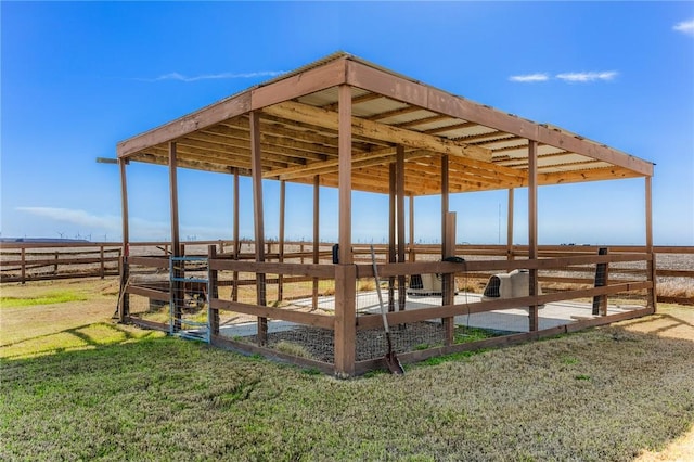 exterior space with an exterior structure and a rural view