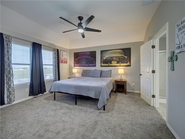 bedroom featuring light colored carpet and ceiling fan