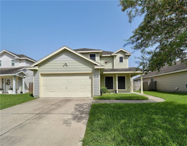 view of front of house featuring a garage and a front yard