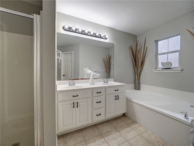 bathroom featuring vanity, tile patterned floors, and plus walk in shower