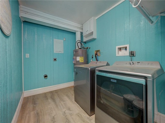 washroom with light wood-style floors, independent washer and dryer, water heater, and baseboards