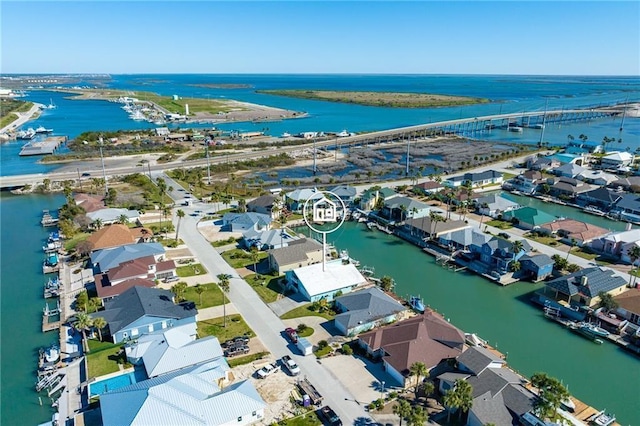 127 Sea Mist Dr, Aransas Pass, TX 78336 - aerial view of residential area with a nearby body of water and a notable bridge