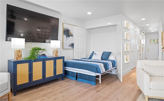 bedroom featuring hardwood / wood-style floors