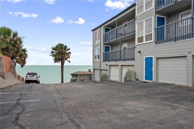 view of property with a water view