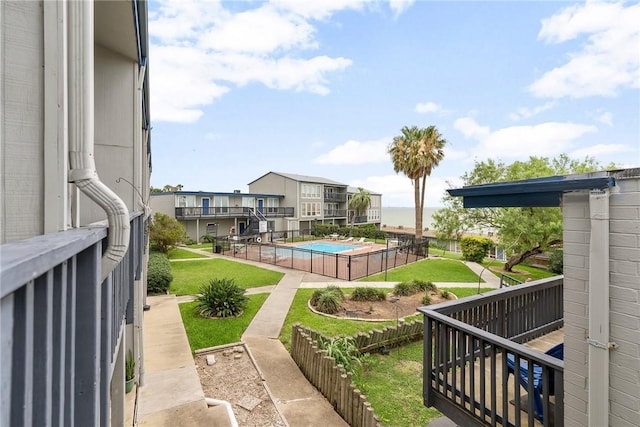 view of yard featuring a fenced in pool