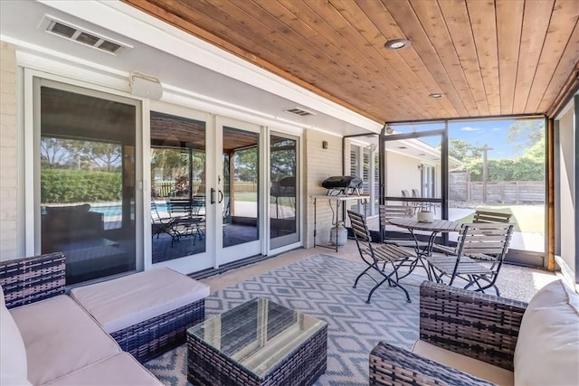 5241 Saint Andrews Dr, Corpus Christi, TX 78413 - sunroom / solarium with an outdoor living space, wood ceiling, and french doors