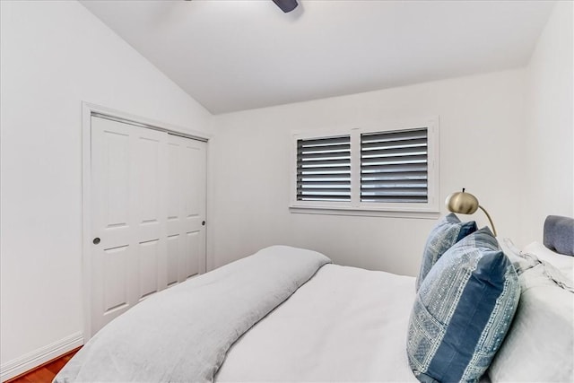 5241 Saint Andrews Dr, Corpus Christi, TX 78413 - bedroom with lofted ceiling, a closet, a ceiling fan, and wood finished floors