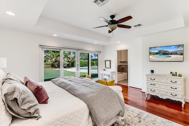 5241 Saint Andrews Dr, Corpus Christi, TX 78413 - bedroom with a tray ceiling, access to outside, wood finished floors, recessed lighting, and french doors