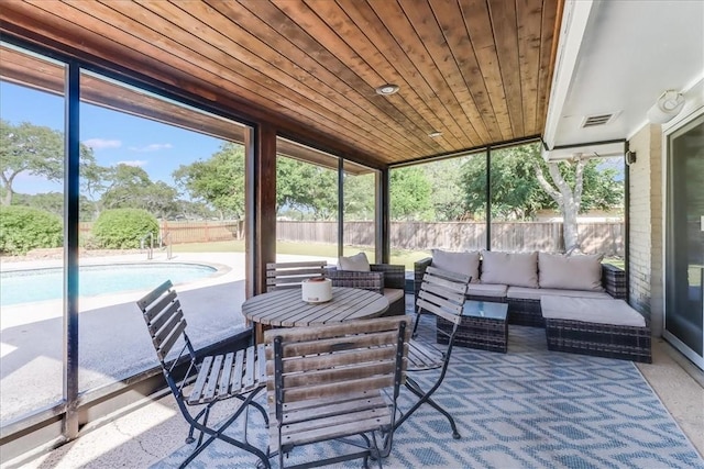 5241 Saint Andrews Dr, Corpus Christi, TX 78413 - sunroom / solarium featuring an outdoor hangout area and healthy amount of natural light