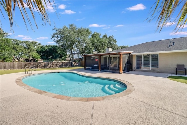 5241 Saint Andrews Dr, Corpus Christi, TX 78413 - view of swimming pool with a sunroom and a patio area