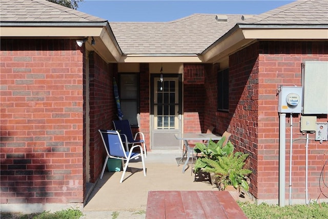 property entrance with a patio area