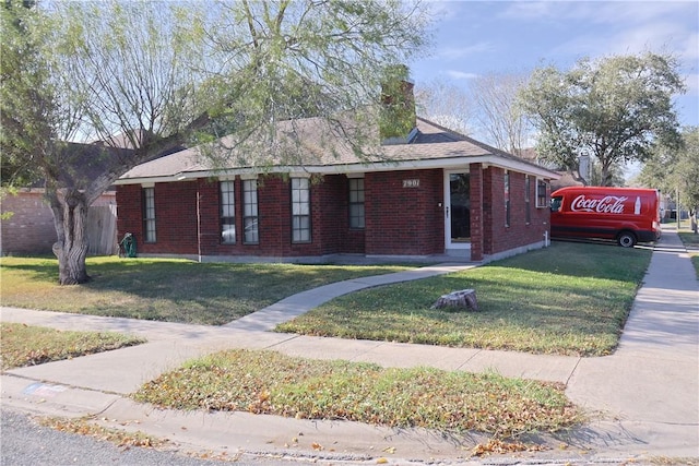 ranch-style home with a front yard