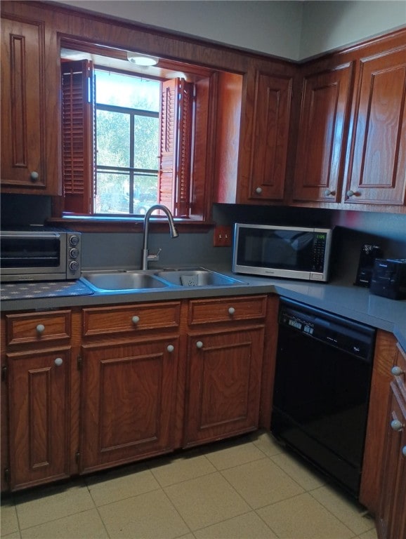 kitchen with dishwasher and sink