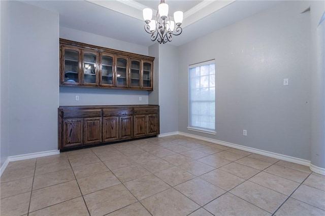 unfurnished dining area featuring light tile patterned floors and a chandelier