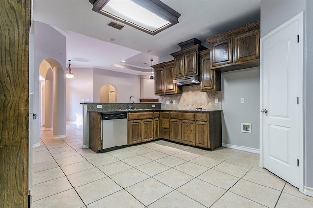 kitchen with dishwasher, sink, kitchen peninsula, decorative backsplash, and light tile patterned flooring