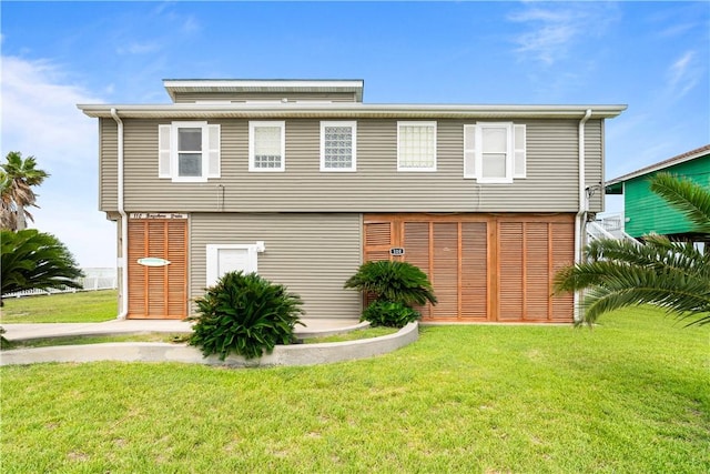 110 Bayshore Dr, Ingleside, TX 78362 - rear view of house featuring a yard