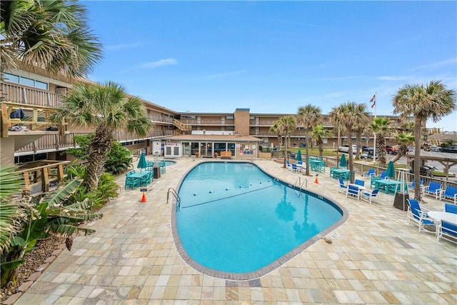 view of pool with a patio area