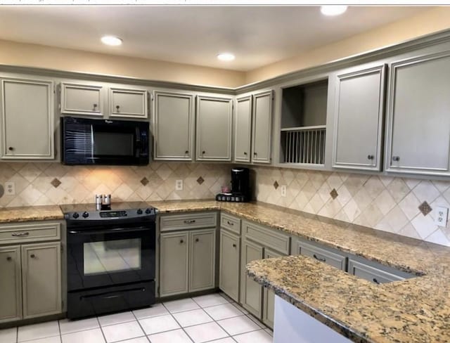 10544 Saddle, Corpus Christi, TX 78410 - kitchen with black appliances, gray cabinetry, open shelves, and light stone countertops