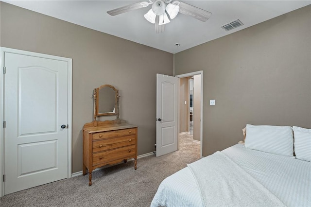 10813 Julianna Dr, Corpus Christi, TX 78410 - bedroom with light colored carpet, ceiling fan, and baseboards