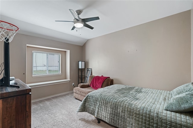 bedroom with carpet floors, ceiling fan, and vaulted ceiling