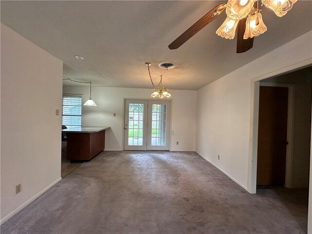 1662 Spicewood Dr, Corpus Christi, TX 78412 - interior space with ceiling fan with notable chandelier, baseboards, visible vents, and carpet flooring