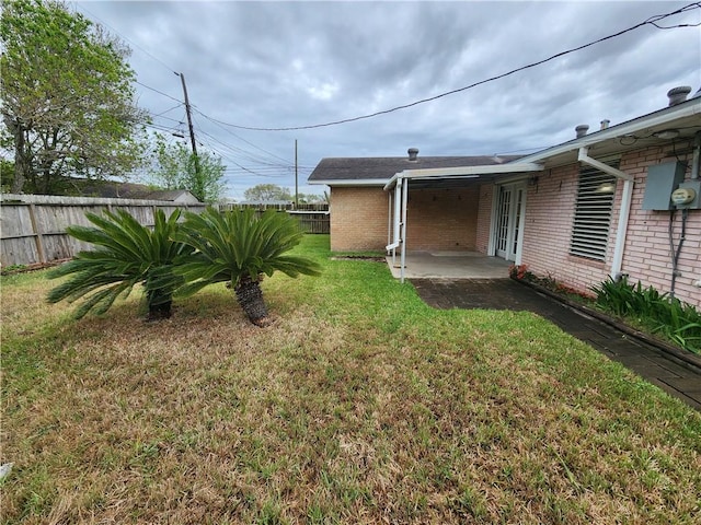 1662 Spicewood Dr, Corpus Christi, TX 78412 - view of yard featuring fence, a patio, and french doors