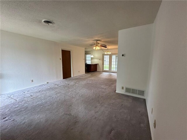 1662 Spicewood Dr, Corpus Christi, TX 78412 - carpeted spare room featuring a textured ceiling, visible vents, and a ceiling fan
