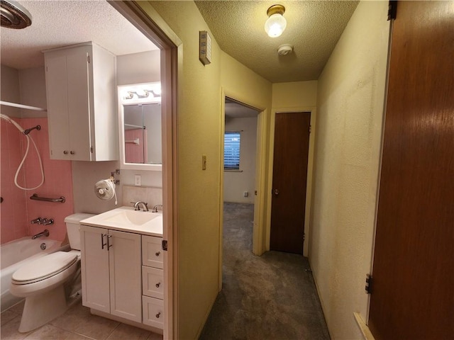 1662 Spicewood Dr, Corpus Christi, TX 78412 - full bath with washtub / shower combination, a textured ceiling, vanity, and toilet