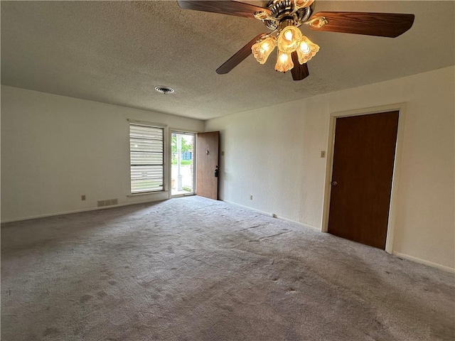 1662 Spicewood Dr, Corpus Christi, TX 78412 - unfurnished room with a ceiling fan, carpet flooring, a textured ceiling, and visible vents