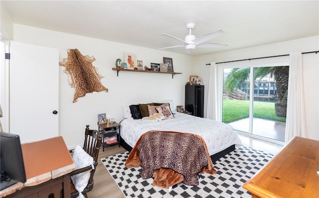 bedroom with access to outside, ceiling fan, and light hardwood / wood-style floors