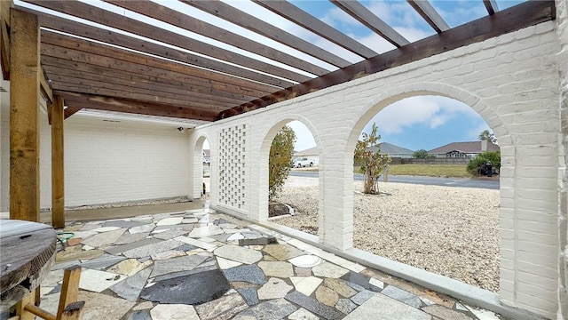 view of patio featuring a pergola