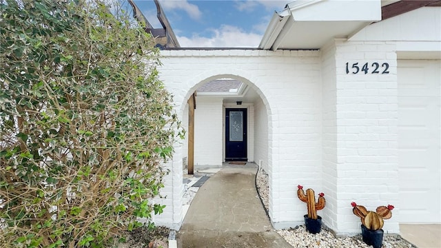 property entrance featuring a garage